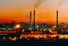 Saudi oil refinery at dusk